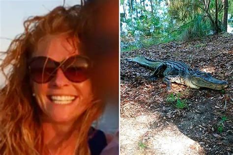 While she is walking away with her dog, the alligator leaps out of the water, trying to. . Woman attacked by alligator video